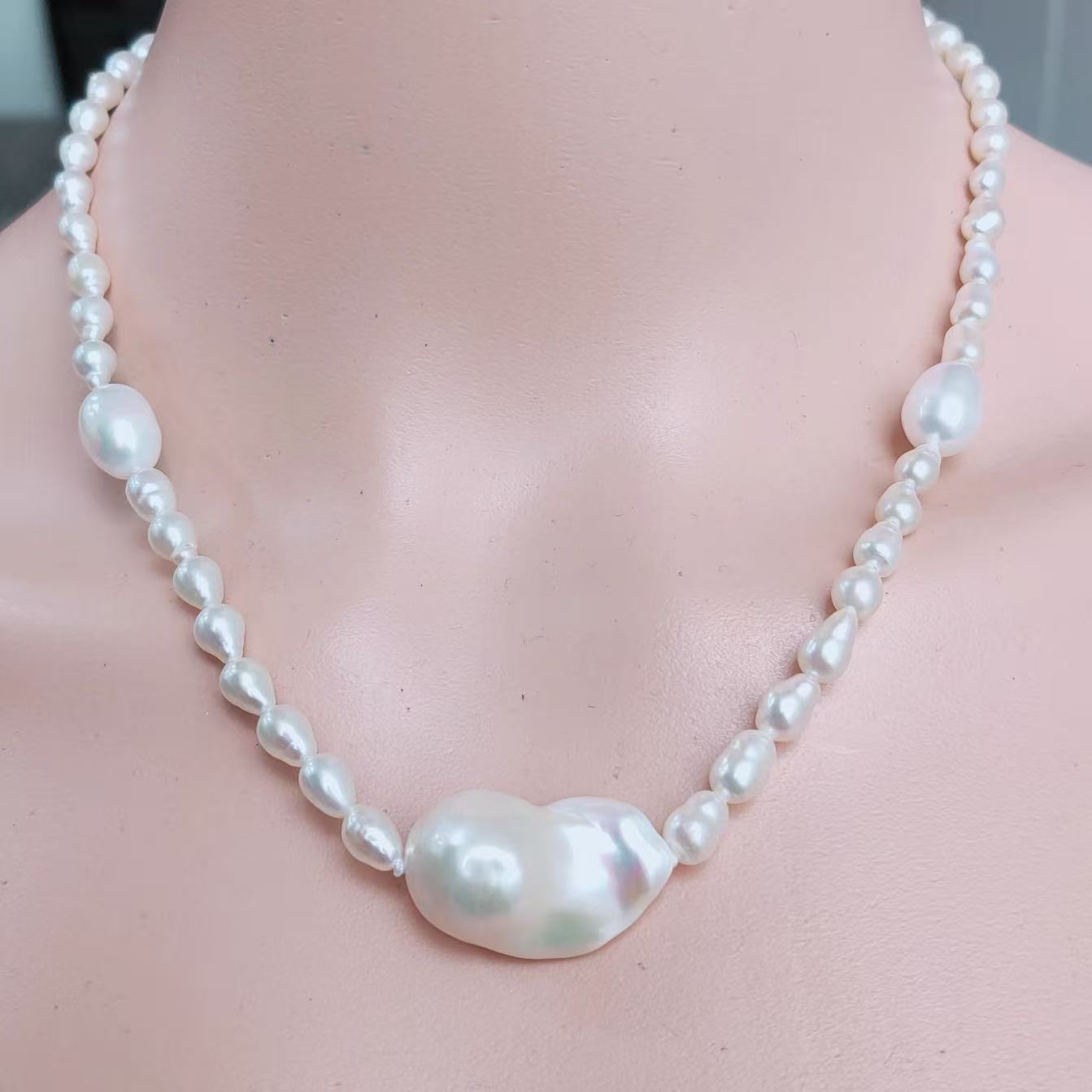 Natural freshwater pearls in water droplet shape + Curved Baroque Necklace