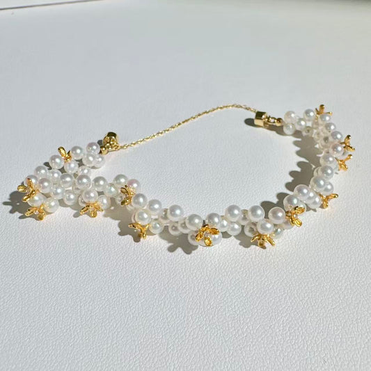 Natural freshwater pearl 3-4mm flower-shaped woven magnetic snap bracelet
