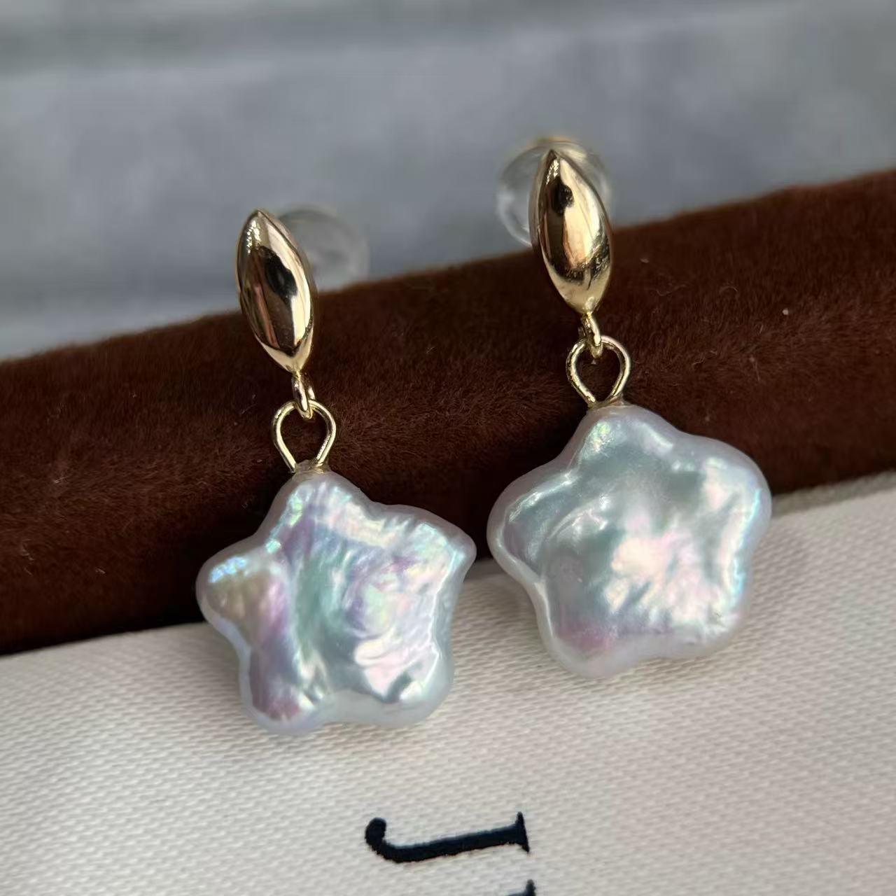 Natural aurora freshwater star-shaped pearl earrings
